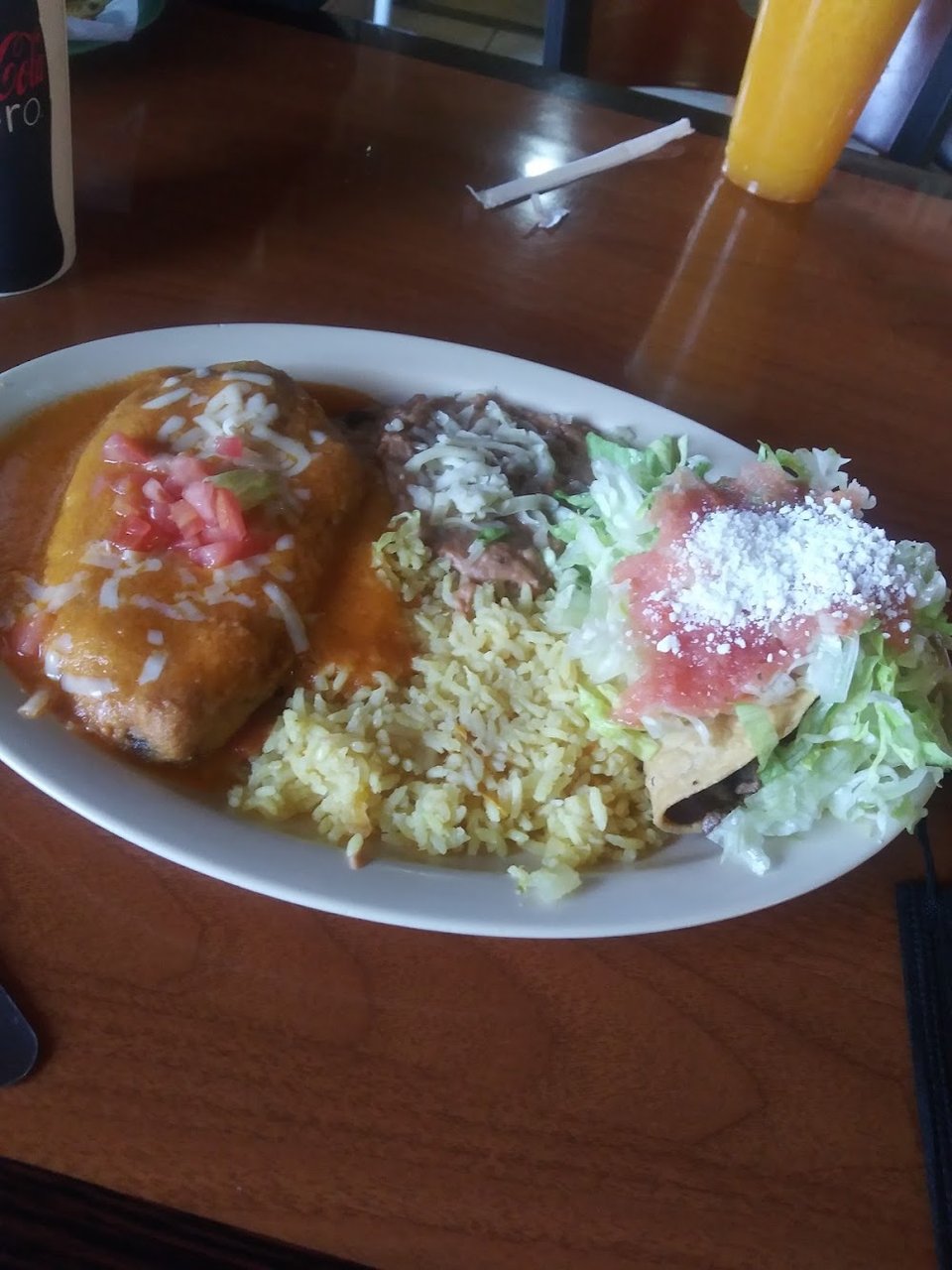 Breakfast plates and quesadillas listed on menu.