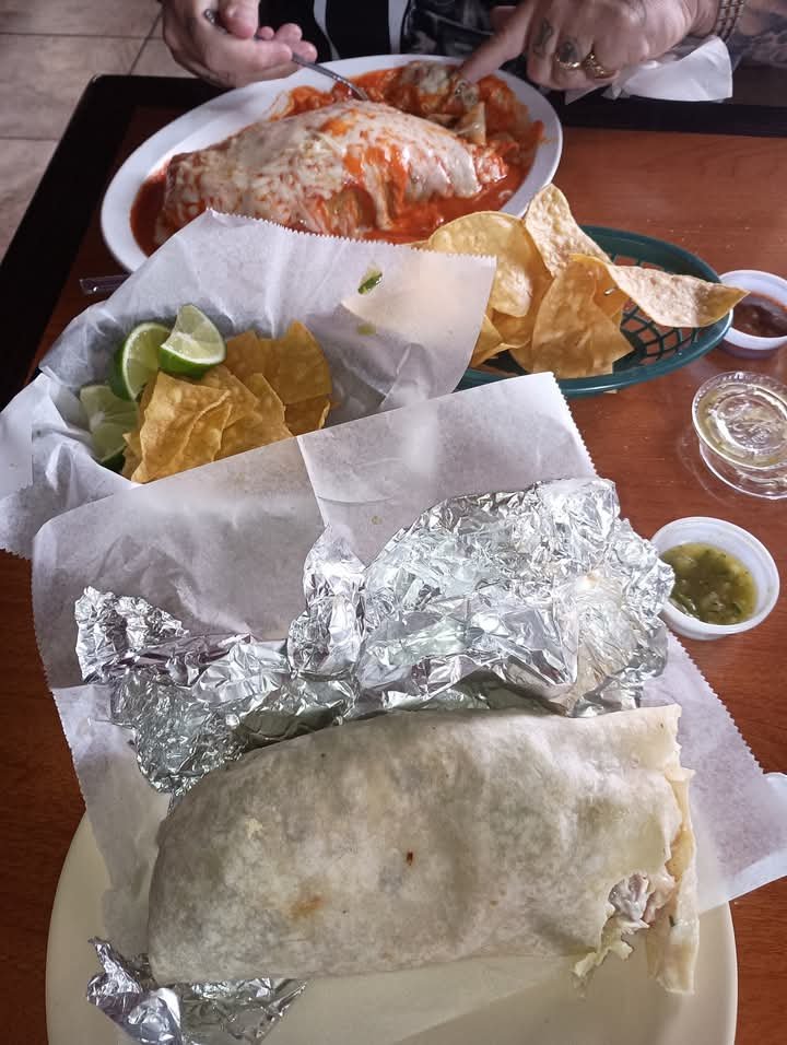 Menu board showing nachos and special plates.