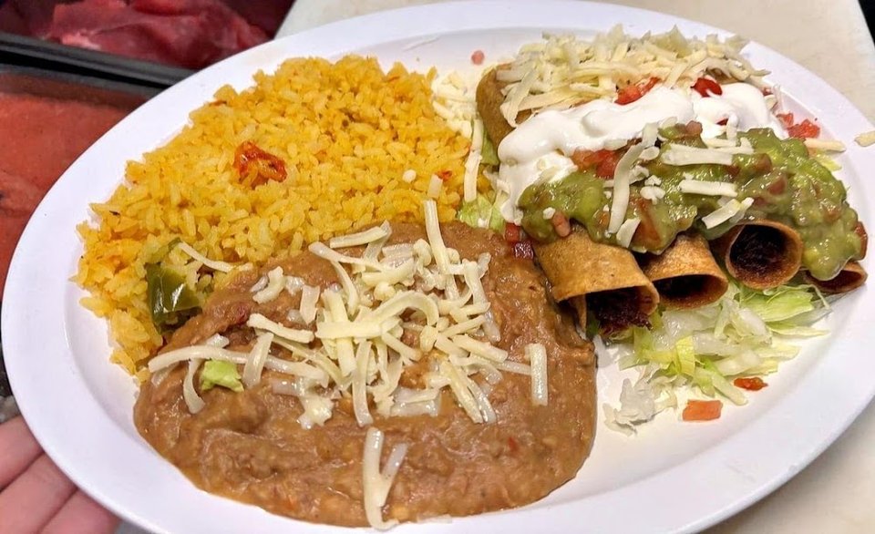 Breakfast plates and quesadillas listed on menu.