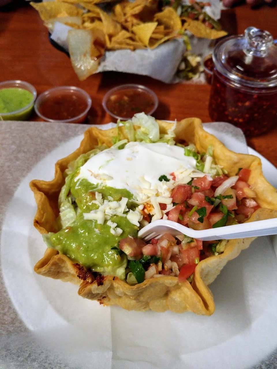 Taquería menu with sides and breakfast options.